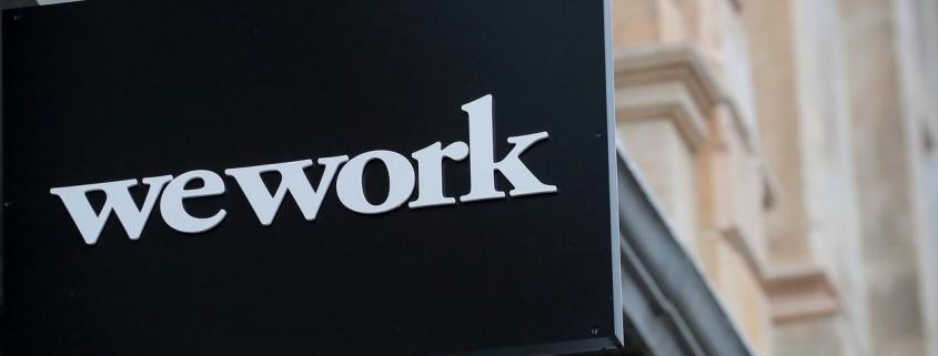 WeWork Parent Weighs Slashing Its Valuation in Half